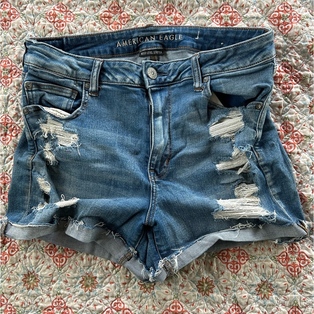 Size 14 Jean shorts. Stretch with lace detail peek through